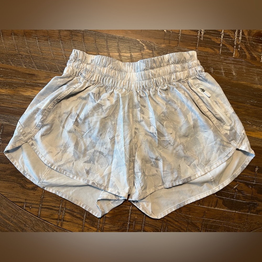 Lululemon track that short. Size 6. White and grey.
